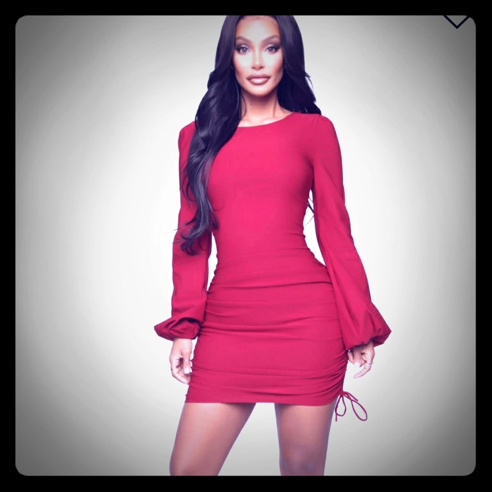 Never been worn red ruched dress. Beautiful dress.